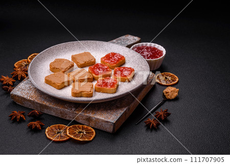 Delicious nutritious sandwiches with peanut butter, strawberry jam Delicious nutritious sandwiches with peanut butter, strawberry jam 111707905