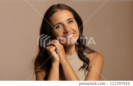 Cheerful european senior woman with perfect skin, enjoy anti-wrinkle treatment Cheerful european senior woman with perfect skin, enjoy anti-wrinkle treatment 111707916