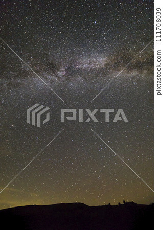 Night landscape of mountains with stars covered sky . 111708039