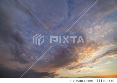 Dramatic sunset sky with orange clouds. 111708330