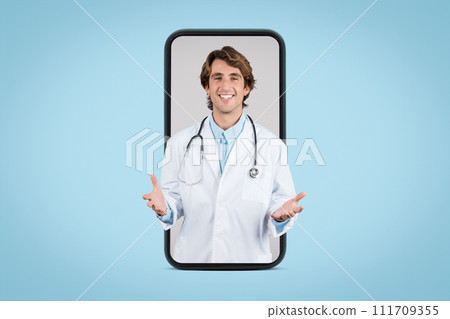 Friendly male doctor in white medical coat having online appointment with patient, posing in huge smartphone screen 111709355