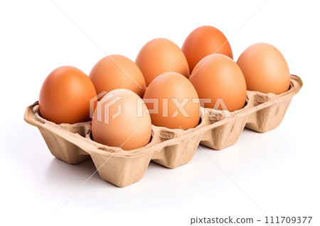 Eggs in a paper tray on a white background Eggs in a paper tray on a white background 111709377