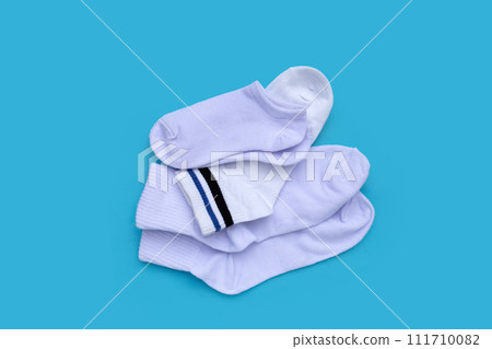 White socks on blue background. 111710082