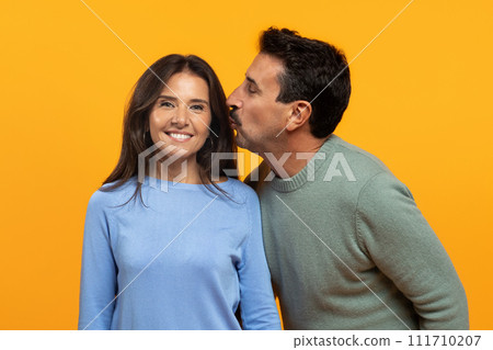 Cheerful senior caucasian man kiss in chick lady, enjoy spare time 111710207