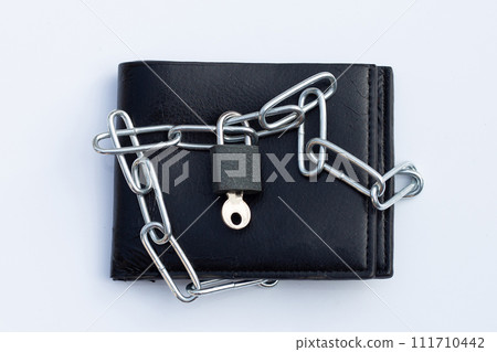 Black wallet in chains closed padlock on white background. Black wallet in chains closed padlock on white background. 111710442