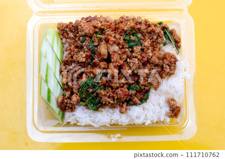 Rice topped with stir-fried pork Rice topped with stir-fried pork 111710762