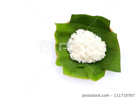 Sticky rice in banana leaves on plate 111710767