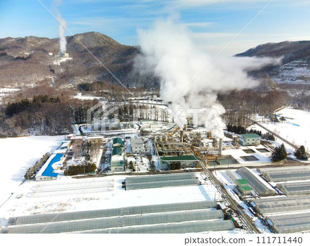 Photographing the scenery of the Hokkaido Electric Power steam production facility in Nigorikawa, Morimachi, Hokkaido in early spring Photographing the scenery of the Hokkaido Electric Power steam production facility in Nigorikawa, Morimachi, Hokkaido in early spring 111711440