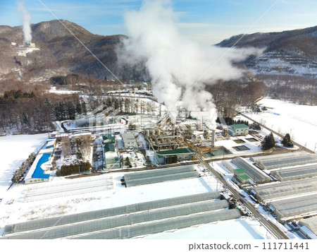Photographing the scenery of the Hokkaido Electric Power steam production facility in Nigorikawa, Morimachi, Hokkaido in early spring Photographing the scenery of the Hokkaido Electric Power steam production facility in Nigorikawa, Morimachi, Hokkaido in early spring 111711441