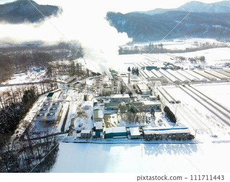 Photographing the scenery of the Hokkaido Electric Power steam production facility in Nigorikawa, Morimachi, Hokkaido in early spring Photographing the scenery of the Hokkaido Electric Power steam production facility in Nigorikawa, Morimachi, Hokkaido in early spring 111711443