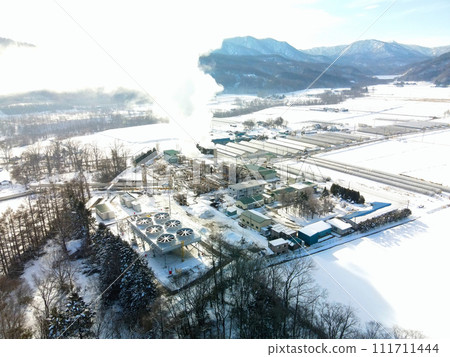 Photographing the scenery of the Hokkaido Electric Power steam production facility in Nigorikawa, Morimachi, Hokkaido in early spring Photographing the scenery of the Hokkaido Electric Power steam production facility in Nigorikawa, Morimachi, Hokkaido in early spring 111711444