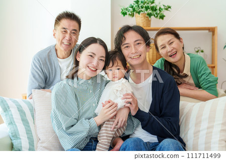 Three generation family: couple, grandparents, baby 111711499
