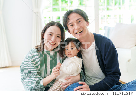 Couple, baby, parent and child portrait Couple, baby, parent and child portrait 111711517