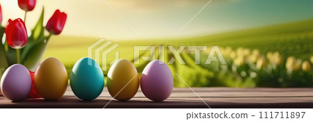 Table with vase of tulips, colorful Easter eggs. Eggs and vase of tulips on kitchen table near window. Happy Easter greeting card, banner, festive background. Blurred background. Copy space. 111711897