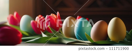 Table with tulips, colorful Easter eggs. Eggs and tulips on kitchen table near window. Happy Easter greeting card, banner, festive background. Blurred background. Copy space. Table with tulips, colorful Easter eggs. Eggs and tulips on kitchen table near window. Happy Easter greeting card, banner, festive background. Blurred background. Copy space. 111711900