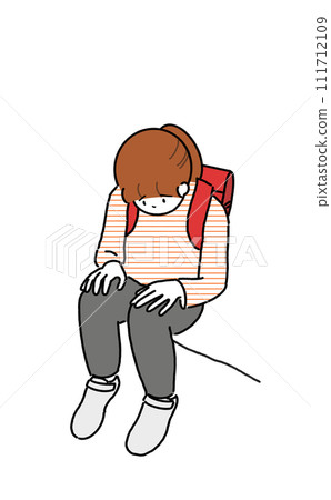 小學生坐下來低頭看 111712109