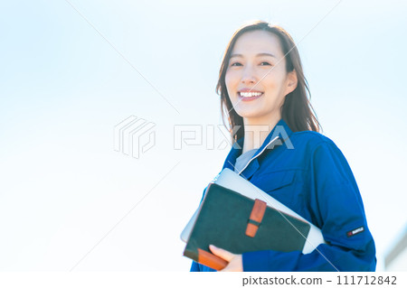 Young woman working at a distribution center Young woman working at a distribution center 111712842
