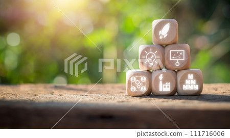 Startup concept, Wooden block on desk with startup icon on virtual screen. Startup concept, Wooden block on desk with startup icon on virtual screen. 111716006
