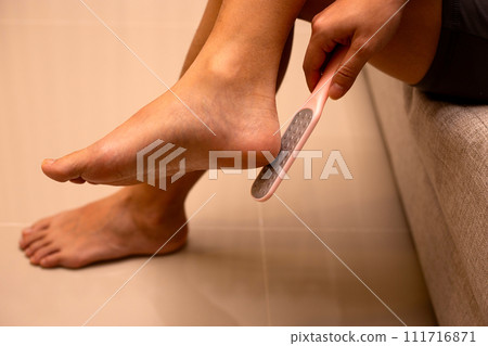 Foot with foot file, Cleansing the heel Foot with foot file, Cleansing the heel 111716871