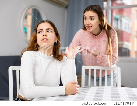 Young female couple having problems in relationship Young female couple having problems in relationship 111717017