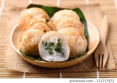 Kanom Krok, Thai coconut pancake with spring onion, Traditional Thai dessert Kanom Krok, Thai coconut pancake with spring onion, Traditional Thai dessert 111717872