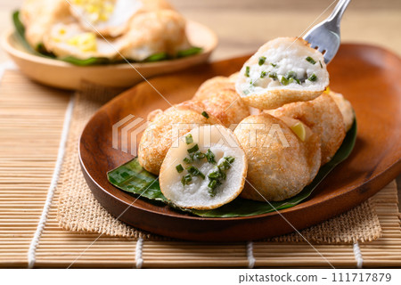 Kanom Krok, Thai coconut pancake with spring onion, Traditional Thai dessert Kanom Krok, Thai coconut pancake with spring onion, Traditional Thai dessert 111717879