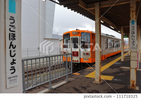 Yuri Kogen Railway toy train entering Ugohonjo Station on the JR Uetsu Main Line Yuri Kogen Railway toy train entering Ugohonjo Station on the JR Uetsu Main Line 111718325