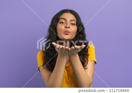 Cute pretty young indian woman sending fly kiss 111718469
