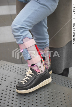 Child cerebral palsy disability, legs orthosis. Child cerebral palsy disability, legs orthosis. 111719315