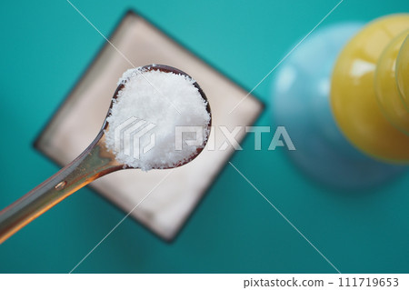 top view of spoon pick salt in a bowl top view of spoon pick salt in a bowl 111719653