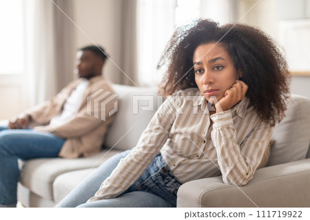 Unhappy young black couple experiencing marriage crisis at home 111719922