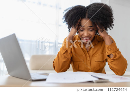 Sad despaired millennial curly black lady student manager has stress with computer 111724654