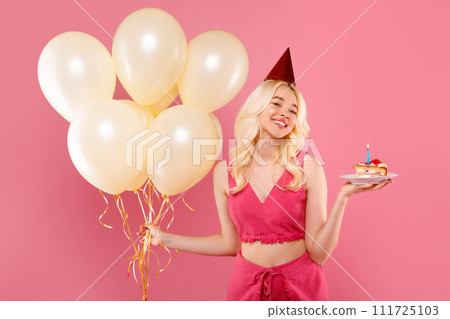 Joyful young blonde lady with balloons and birthday cake, party mood Joyful young blonde lady with balloons and birthday cake, party mood 111725103
