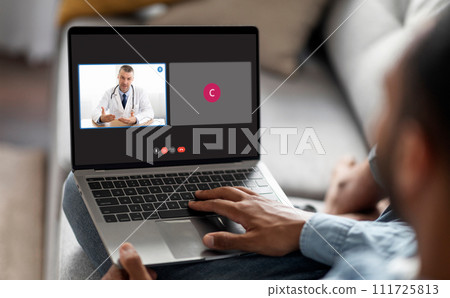 Black man have video call with his doctor 111725813