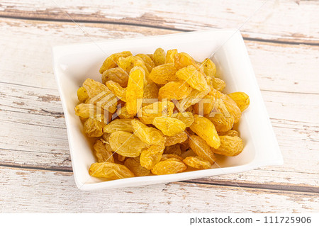 Yellow raisin - dry grape berries 111725906