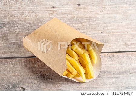 Crispy salted French fry potato 111726497