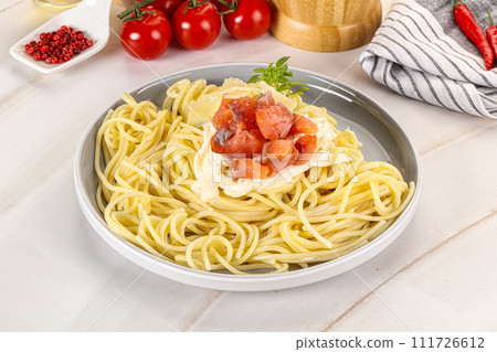 Pasta spaghetti with salmon and stracciatella 111726612