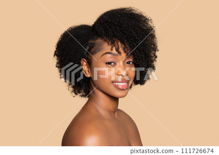 Radiant beauty with natural curly hair 111726674