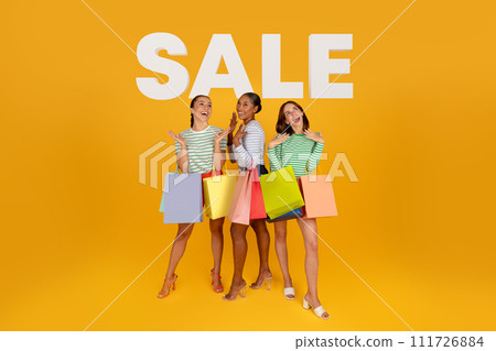 diverse women with shopping bags over background with word sale diverse women with shopping bags over background with word sale 111726884