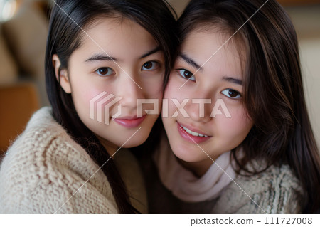 cute sister smiles 111727008