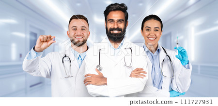 A diverse group of medical professionals, including a male doctor holding a pill and a female doctor 111727931