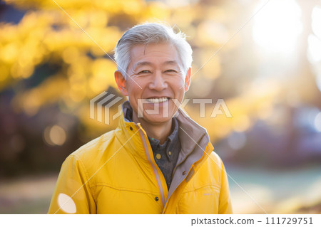 Senior man walking in the park 111729751