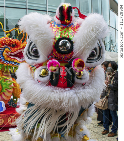 Yokohama Chinatown Chinese New Year Festival, Harvesting, Chinese New Year Praying Lion Dance, in front of Yokohama Marine Tower Yokohama Chinatown Chinese New Year Festival, Harvesting, Chinese New Year Praying Lion Dance, in front of Yokohama Marine Tower 111729904