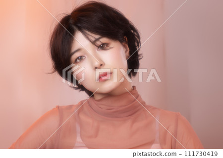 Portrait of a young woman photographed with colorful background 111730419