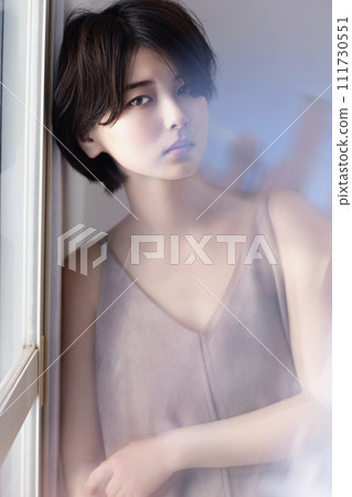 Beauty image of a young black-haired woman Beauty image of a young black-haired woman 111730551