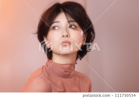 Portrait of a young woman photographed with colorful background 111730554