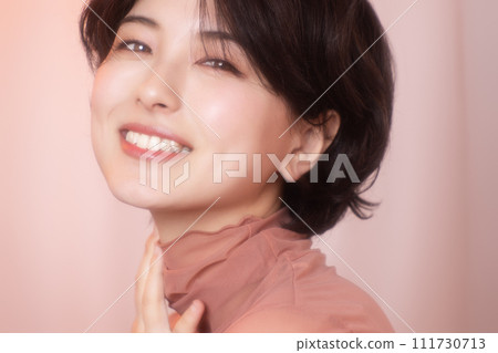 Portrait of a young woman photographed with colorful background 111730713