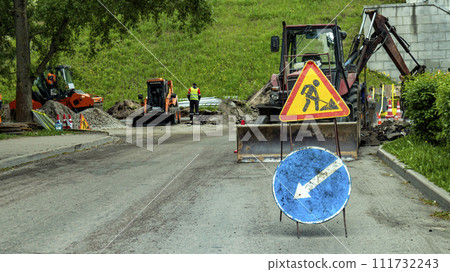 work is underway on the construction of an asphalt road surface 111732243