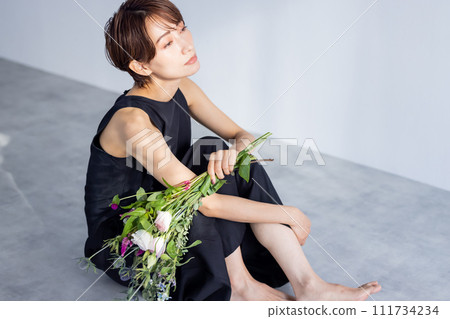 Woman with a bouquet 111734234