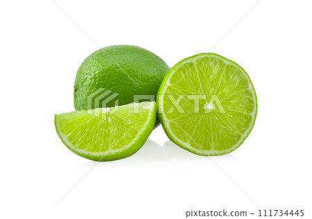 whole and half with slice of fresh green lime isolated on white background whole and half with slice of fresh green lime isolated on white background 111734445